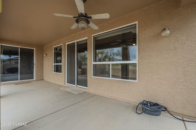 view of patio with a ceiling fan
