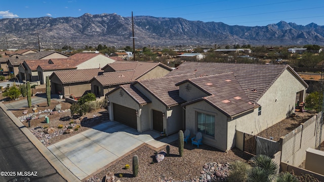 62361 E Border Rock Rd, Saddlebrooke, AZ 85739 - aerial view of property and surrounding area with a mountainous background