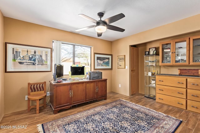 4720 E Wagon Train Rd, Tucson, AZ 85739 - office area featuring a ceiling fan and wood finish floors