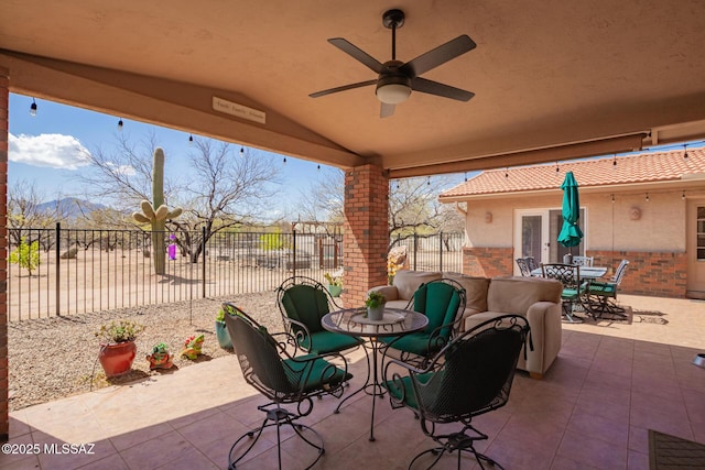4720 E Wagon Train Rd, Tucson, AZ 85739 - view of patio / terrace featuring fence, outdoor dining space, and ceiling fan