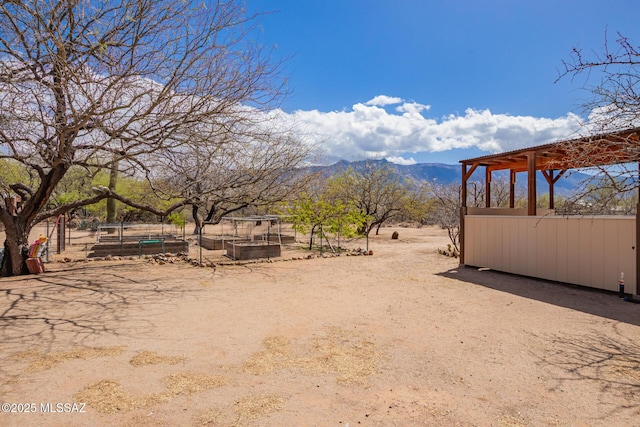 4720 E Wagon Train Rd, Tucson, AZ 85739 - view of yard featuring a mountain view