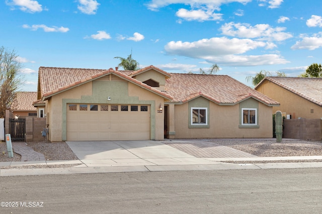 9704 E Paseo, San Rosendo, Tucson, AZ 85747 - view of front of house with a tiled roof, concrete driveway, a garage, and stucco siding