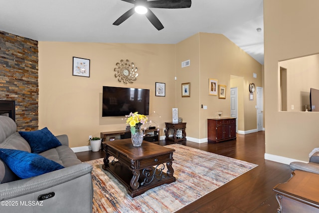 9704 E Paseo, San Rosendo, Tucson, AZ 85747 - living room featuring lofted ceiling, baseboards, a ceiling fan, visible vents, and dark wood finished floors