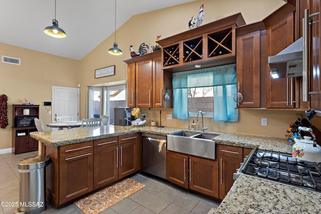 9704 E Paseo, San Rosendo, Tucson, AZ 85747 - kitchen featuring visible vents, dishwasher, a sink, a peninsula, and range with gas stovetop