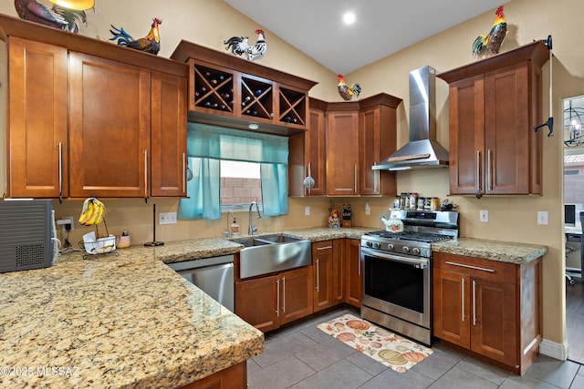 9704 E Paseo, San Rosendo, Tucson, AZ 85747 - kitchen featuring wall chimney exhaust hood, a sink, stainless steel appliances, light stone counters, and lofted ceiling