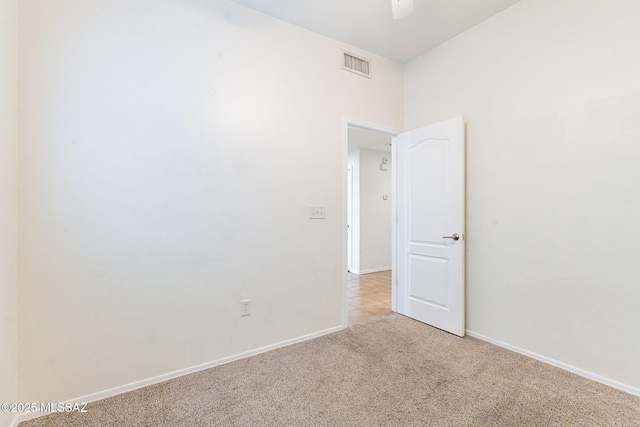 4173 N Fortune Loop, Tucson, AZ 85719 - unfurnished room with light colored carpet and baseboards