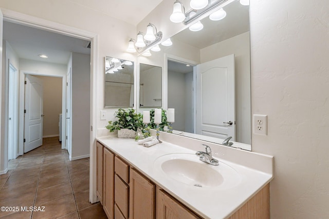 4173 N Fortune Loop, Tucson, AZ 85719 - bathroom with vanity, tile patterned flooring, and a chandelier