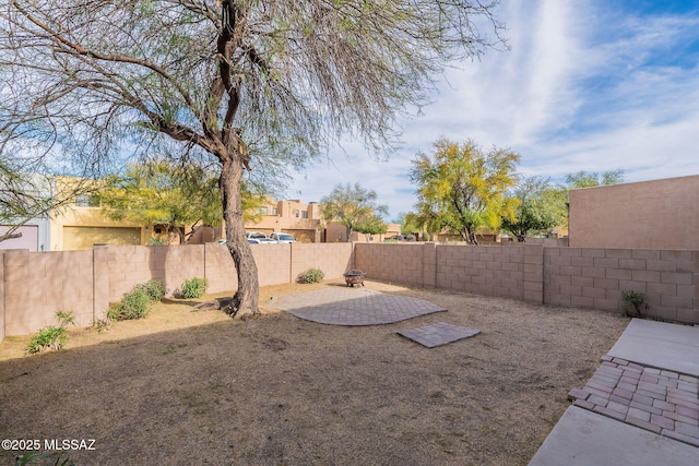 4173 N Fortune Loop, Tucson, AZ 85719 - fenced backyard featuring a patio area