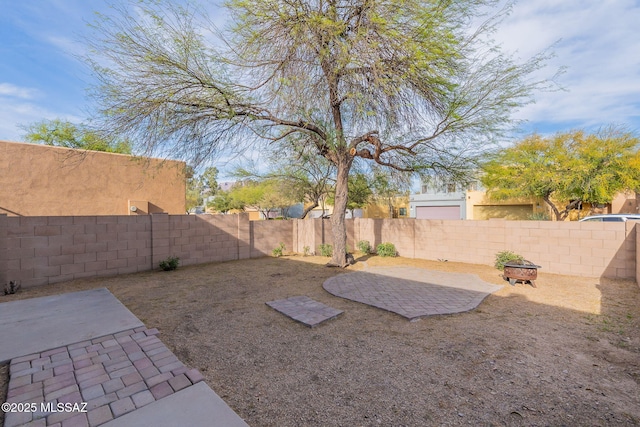 4173 N Fortune Loop, Tucson, AZ 85719 - fenced backyard with a patio area