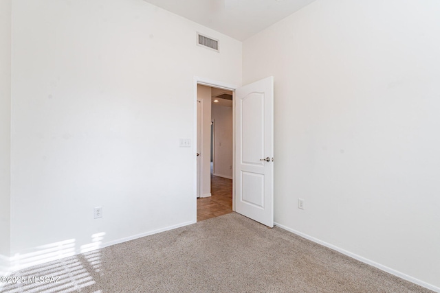 4173 N Fortune Loop, Tucson, AZ 85719 - unfurnished room featuring carpet floors and baseboards
