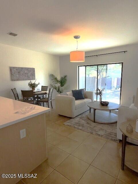 4173 N Fortune Loop, Tucson, AZ 85719 - living room with light tile patterned floors