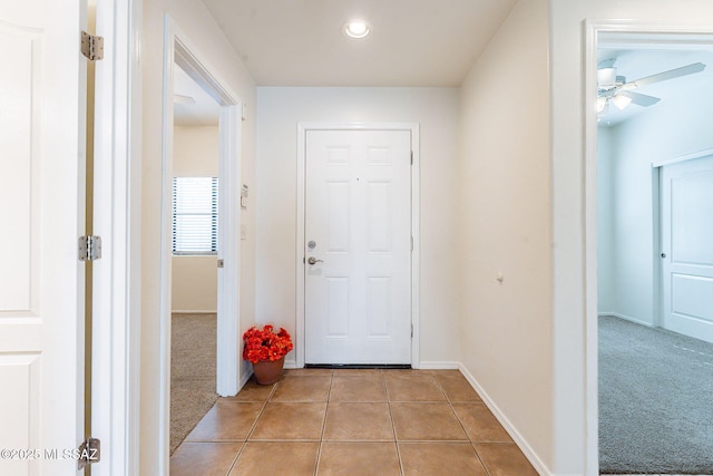 4173 N Fortune Loop, Tucson, AZ 85719 - entryway with light tile patterned floors, baseboards, recessed lighting, ceiling fan, and light carpet
