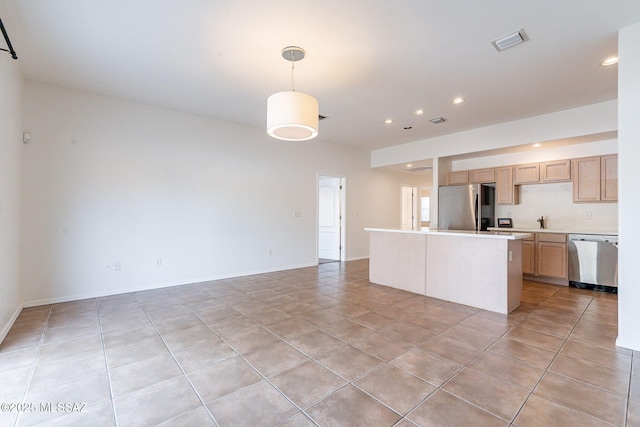 4173 N Fortune Loop, Tucson, AZ 85719 - kitchen with stainless steel dishwasher, freestanding refrigerator, light brown cabinetry, light tile patterned floors, and light countertops