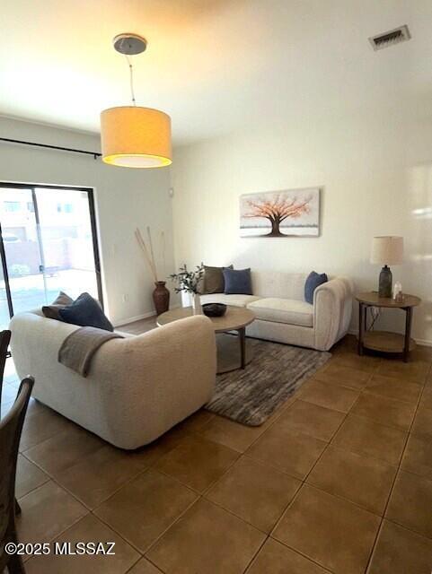 4173 N Fortune Loop, Tucson, AZ 85719 - living area featuring tile patterned floors