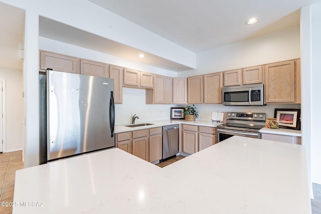 4173 N Fortune Loop, Tucson, AZ 85719 - kitchen with appliances with stainless steel finishes, a sink, light brown cabinets, recessed lighting, and light tile patterned floors