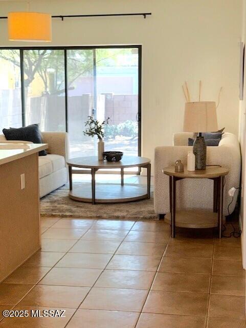 4173 N Fortune Loop, Tucson, AZ 85719 - sitting room featuring plenty of natural light and light tile patterned floors