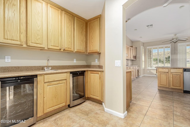kitchen with dishwasher, ceiling fan, light brown cabinets, beverage cooler, and light tile patterned floors
