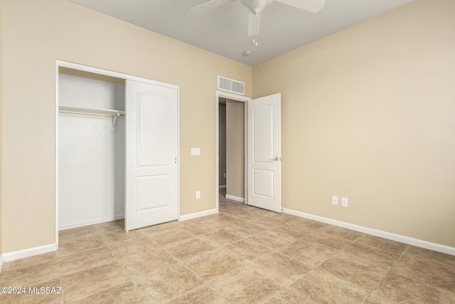 unfurnished bedroom with baseboards, visible vents, a closet, and a ceiling fan