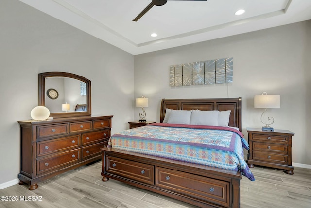 bedroom featuring light wood-style floors, recessed lighting, and baseboards