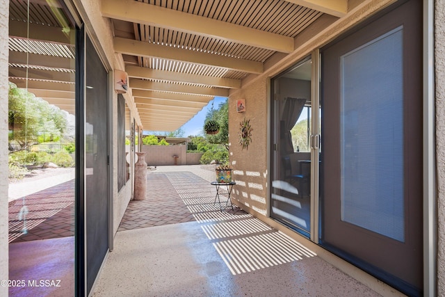 view of patio / terrace featuring fence