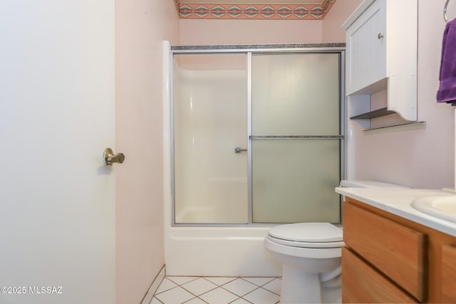 full bathroom with tile patterned flooring, vanity, and toilet