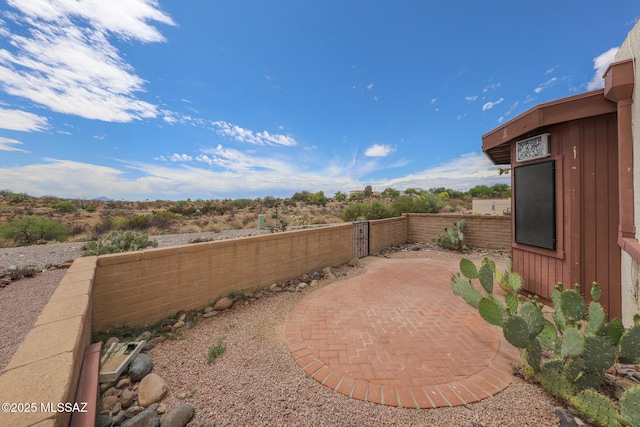 view of yard featuring a fenced backyard and a patio