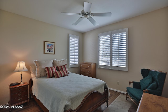 5200 E Calle Vista De Colores, Tucson, AZ 85711 - bedroom with wood finished floors, baseboards, and a ceiling fan
