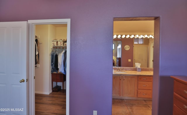 5200 E Calle Vista De Colores, Tucson, AZ 85711 - bathroom with vanity and a walk in closet