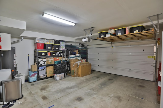 5200 E Calle Vista De Colores, Tucson, AZ 85711 - garage with water heater and a garage door opener