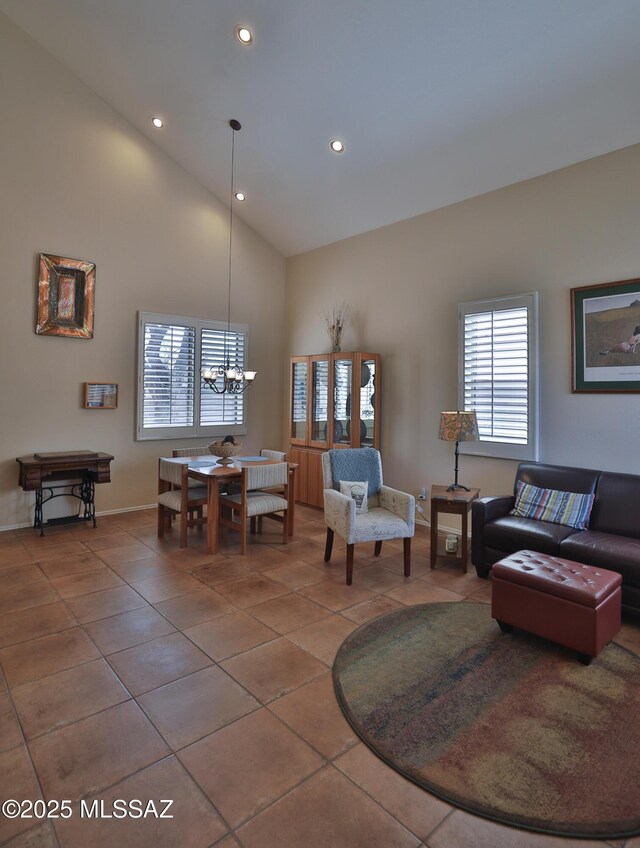 5200 E Calle Vista De Colores, Tucson, AZ 85711 - living area featuring tile patterned flooring, high vaulted ceiling, recessed lighting, and baseboards