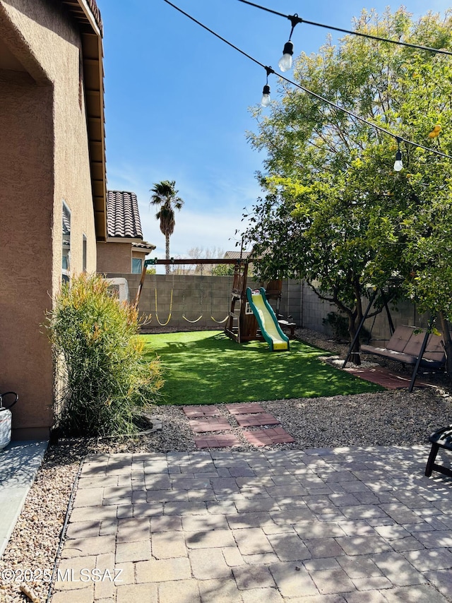 8332 S Otis Dr, Tucson, AZ 85747 - view of yard featuring a fenced backyard and a patio area