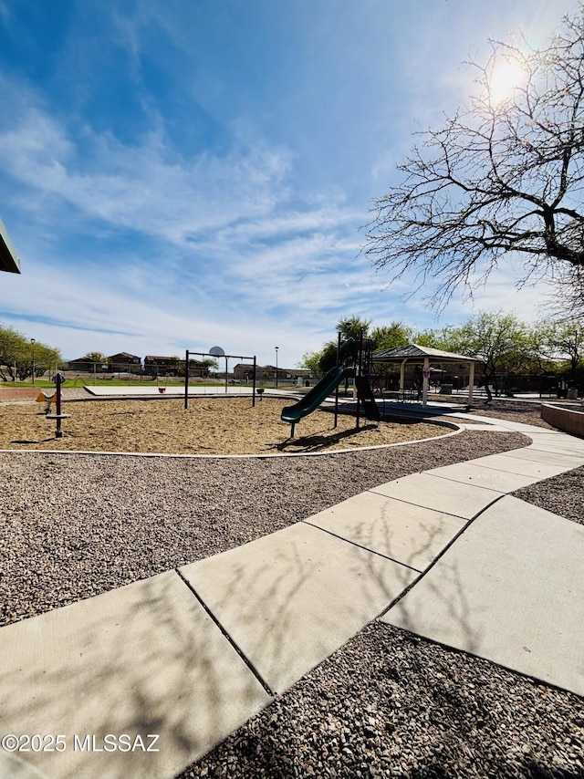 8332 S Otis Dr, Tucson, AZ 85747 - mediterranean / spanish-style home with concrete driveway, a tiled roof, stucco siding, and a garage