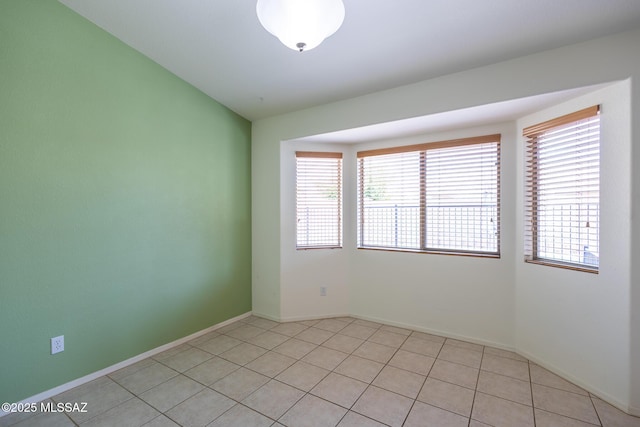 10532 E Malta St, Tucson, AZ 85747 - unfurnished room with healthy amount of natural light, baseboards, and light tile patterned floors