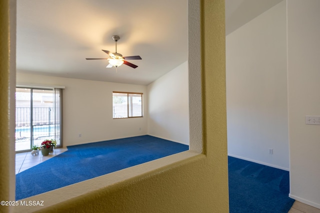 10532 E Malta St, Tucson, AZ 85747 - carpeted spare room with ceiling fan, plenty of natural light, baseboards, and lofted ceiling