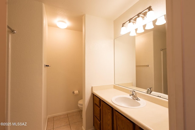 10532 E Malta St, Tucson, AZ 85747 - bathroom with toilet, tile patterned flooring, and vanity