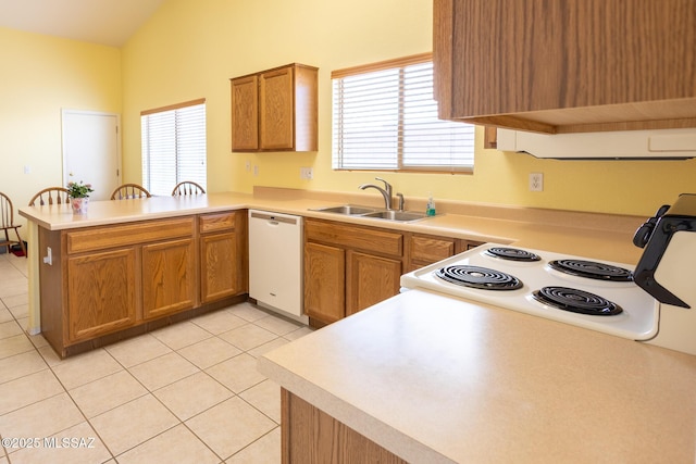 10532 E Malta St, Tucson, AZ 85747 - kitchen featuring white appliances, a sink, a peninsula, light tile patterned floors, and light countertops