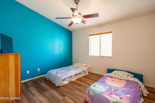 10532 E Malta St, Tucson, AZ 85747 - bedroom featuring wood finished floors, baseboards, ceiling fan, and vaulted ceiling