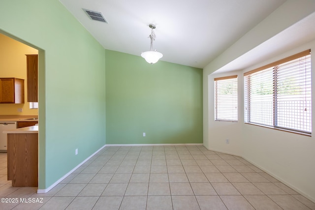 10532 E Malta St, Tucson, AZ 85747 - spare room featuring light tile patterned flooring and baseboards