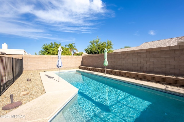 10532 E Malta St, Tucson, AZ 85747 - view of swimming pool featuring a fenced backyard