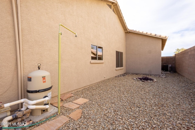10532 E Malta St, Tucson, AZ 85747 - view of home's exterior featuring stucco siding and fence