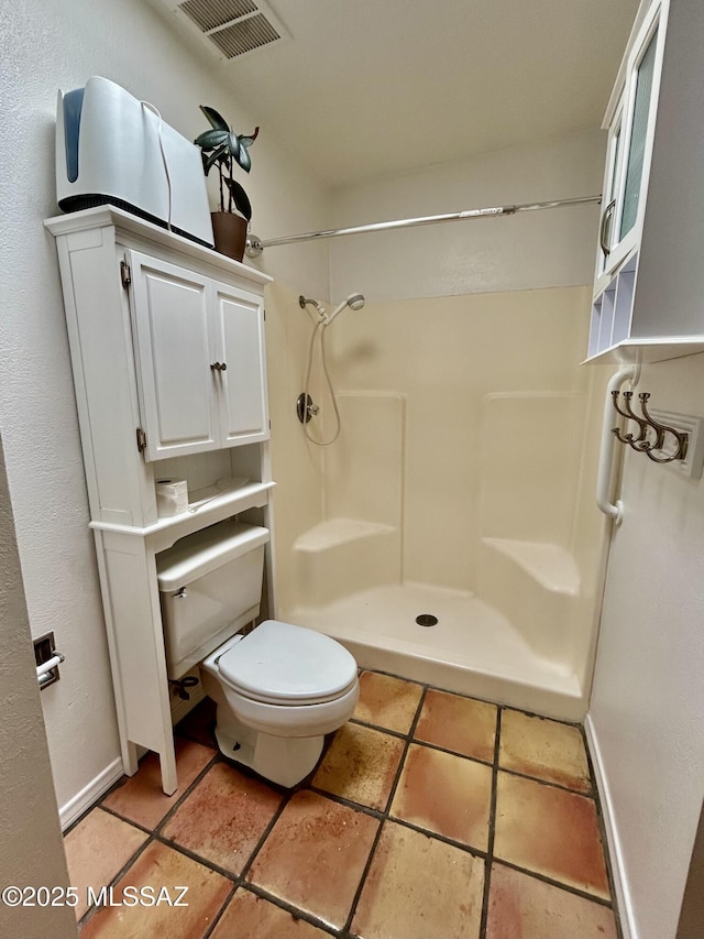 full bath featuring visible vents, a stall shower, and toilet