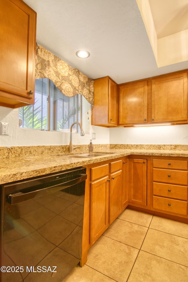 kitchen featuring a sink, light tile patterned floors, dishwasher, and a healthy amount of sunlight