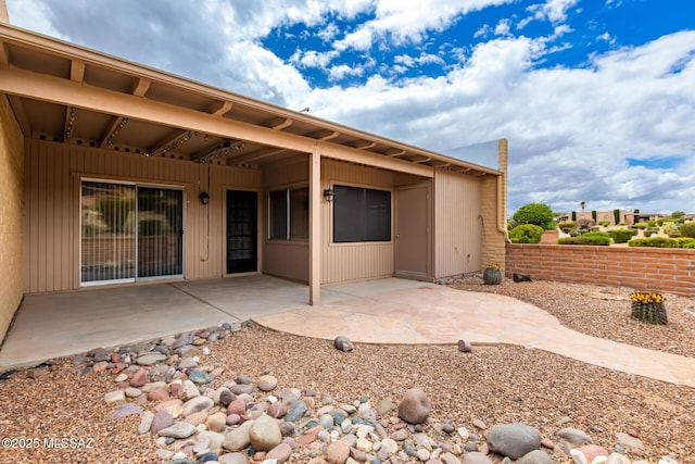 back of house featuring a patio