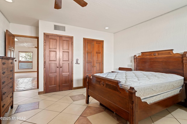 bedroom featuring light tile patterned floors, visible vents, ceiling fan, and recessed lighting
