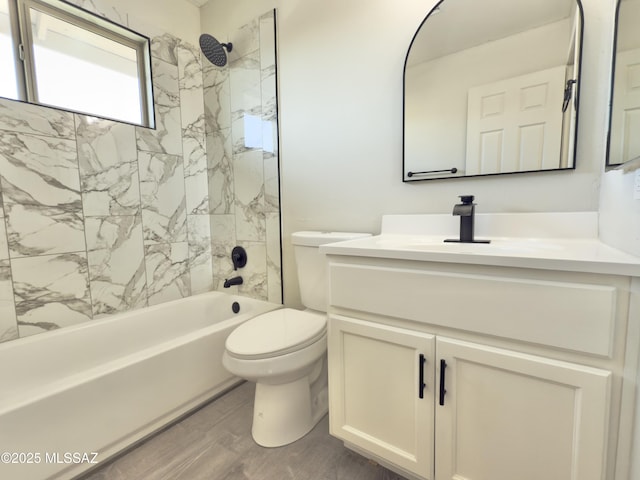 3438 Avenida Del Pueblo, Tucson, AZ 85746 - full bathroom featuring toilet, vanity, wood finished floors, and  shower combination