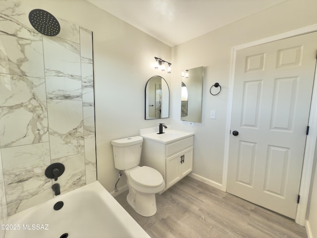 3438 Avenida Del Pueblo, Tucson, AZ 85746 - full bathroom featuring baseboards, wood finished floors, vanity, and toilet