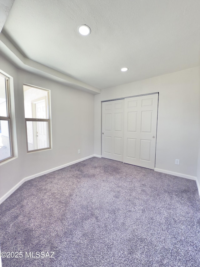 3438 Avenida Del Pueblo, Tucson, AZ 85746 - unfurnished bedroom with recessed lighting, carpet, a closet, and baseboards