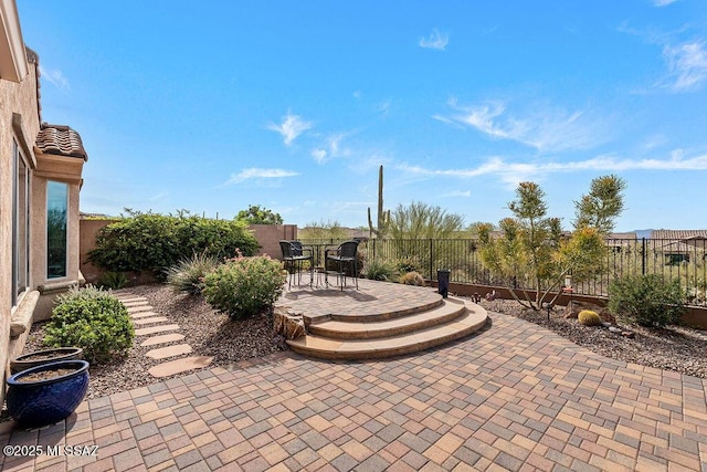 view of patio with a fenced backyard