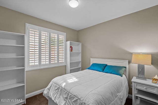 bedroom with baseboards