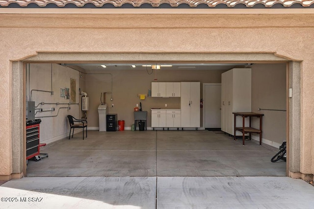garage featuring water heater